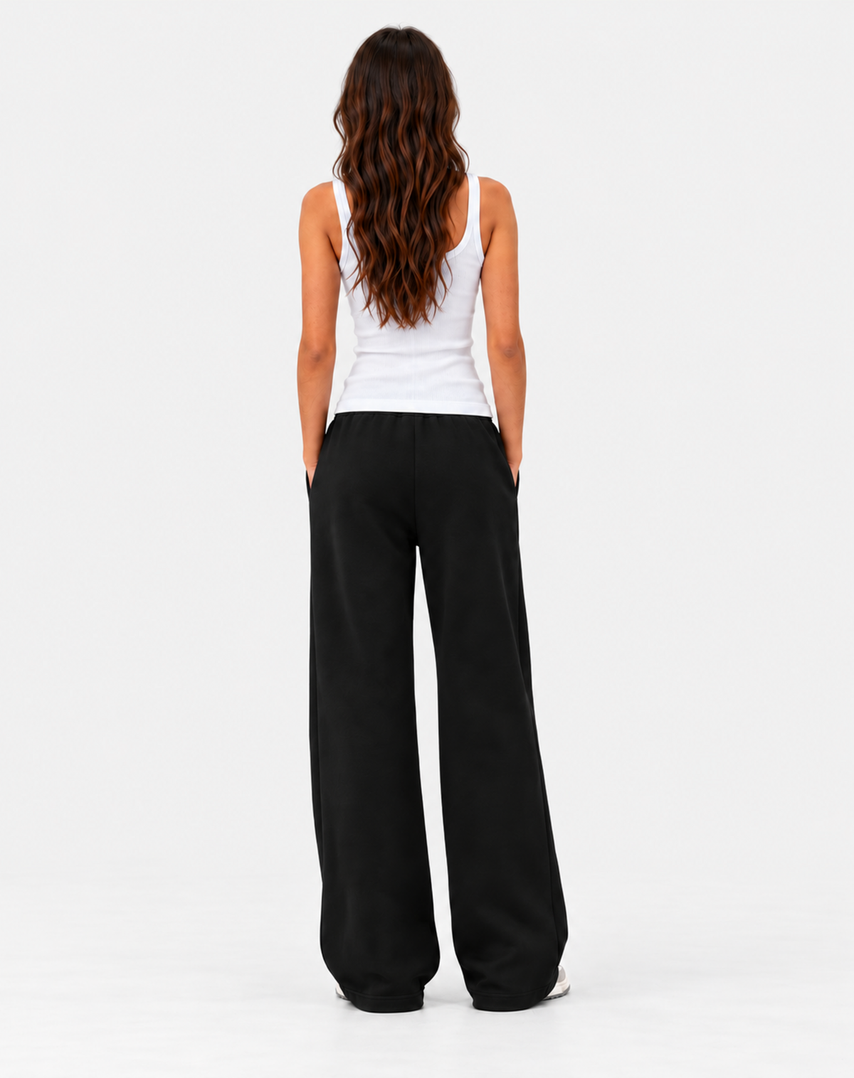 Jogging femme ATNT PARIS noir, dos, fond gris neutre